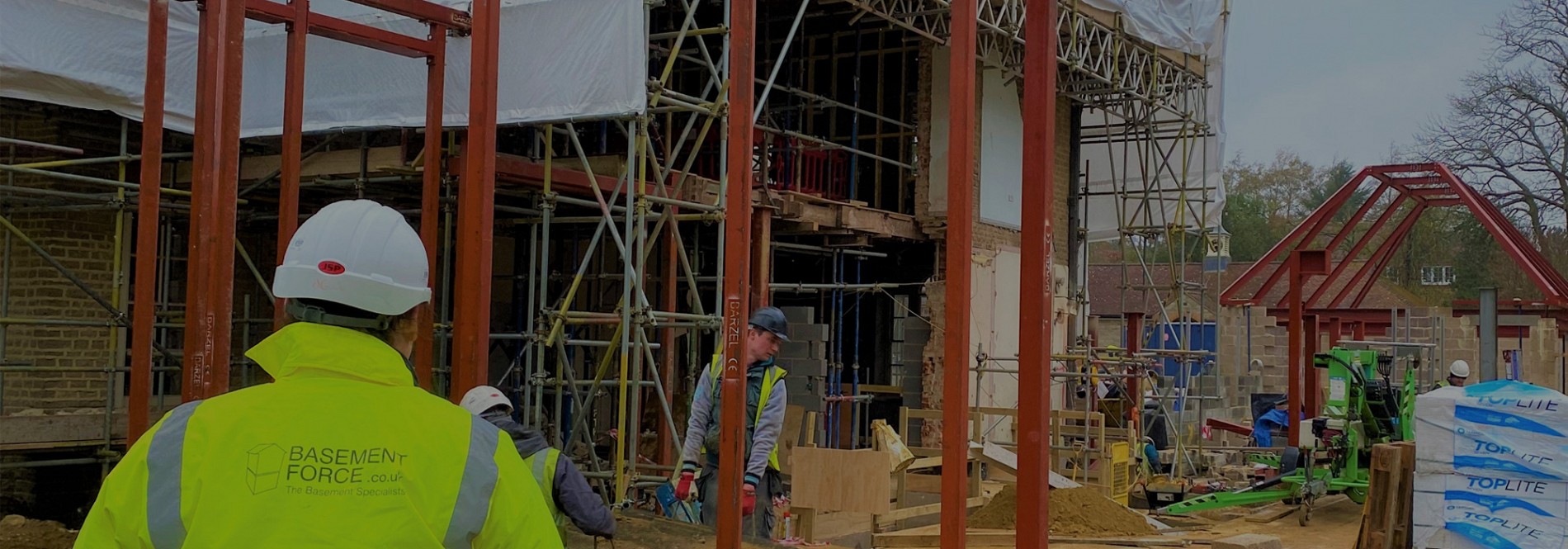 Basement Force employee overlooking site